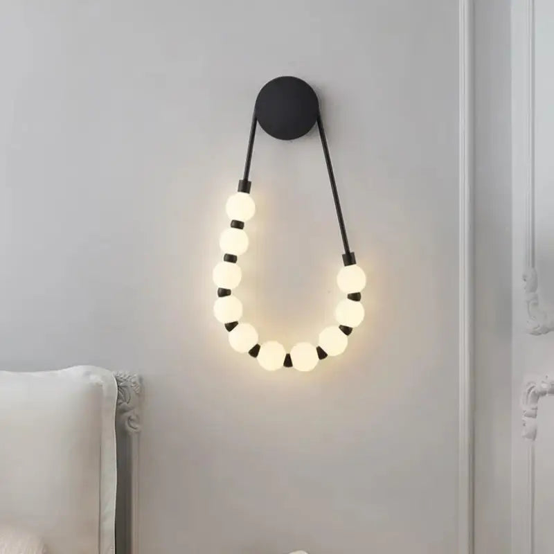 Kinkiet łazienkowy naszafkowy w stylu art déco